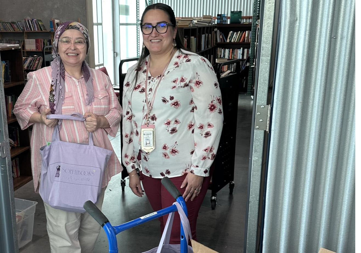 Donated books being collected from a doorstep in Central Texas
