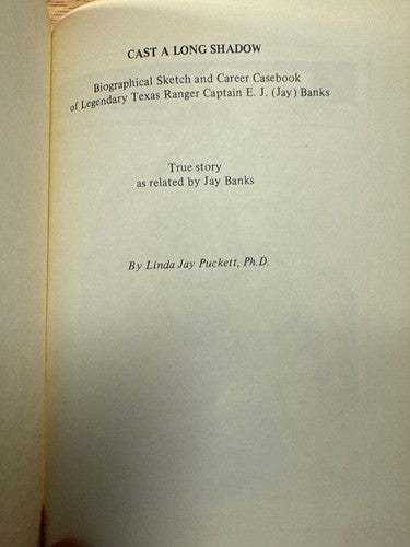 SIGNED Cast a long shadow: Biographical sketch of Captain E.J. (Jay) Banks