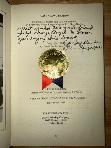 SIGNED Cast a long shadow: Biographical sketch of Captain E.J. (Jay) Banks